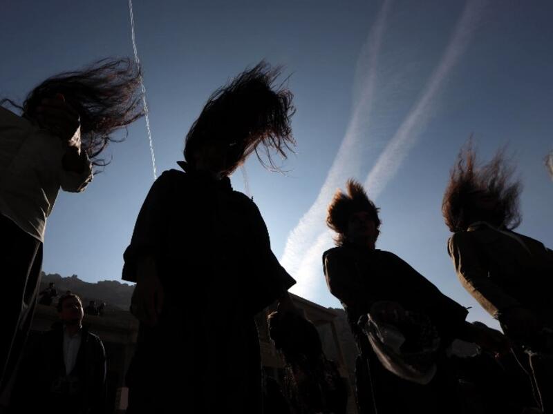 Iraqi Sufi Muslim Kurds take part in a ritual ceremony to commemorate the birth of the Prophet Mohammed.
SAFIN HAMED / AFP