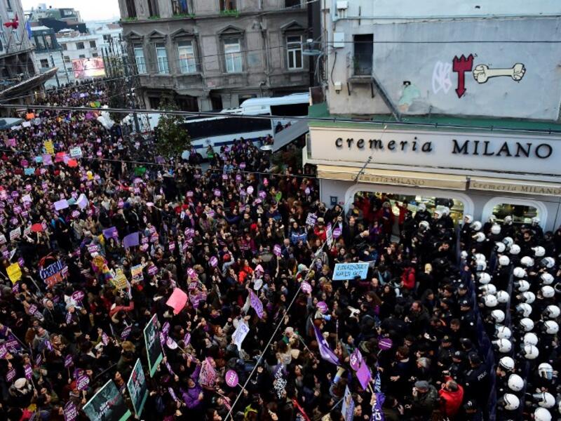 Women's rights activists gather to march through Taksim Square to protest against gender violence in Istanbul, on November 25, 2018, on the International Day for the Elimination of Violence against Women. 
Yasin AKGUL / AFP