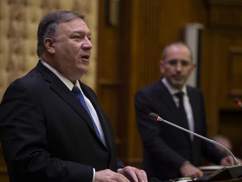 US Secretary of State Mike Pompeo (L) holds a press conference with Jordanian Foreign Minister Ayman Safadi in Amman at the start of a Middle East tour to show commitment to the region after the US President's surprise decision to withdraw troops from war-torn Syria on January 8, 2019. 
ANDREW CABALLERO-REYNOLDS / POOL / AFP