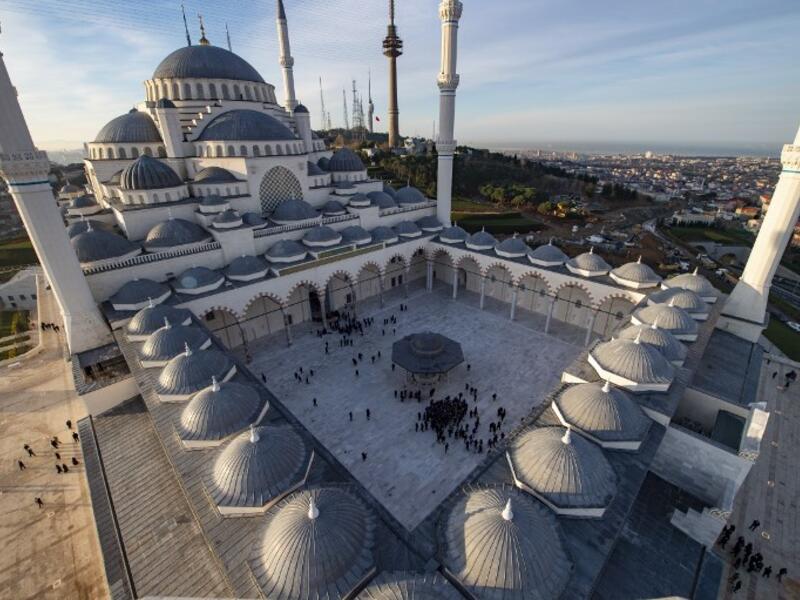 People arrive for the early morning prayers at the Camlica Mosque in Istanbul, which opened March 7, 2019. Hundreds of people arrived to attend the first ever prayer at the largest mosque in Asia Minor.
YASIN AKGUL / AFP