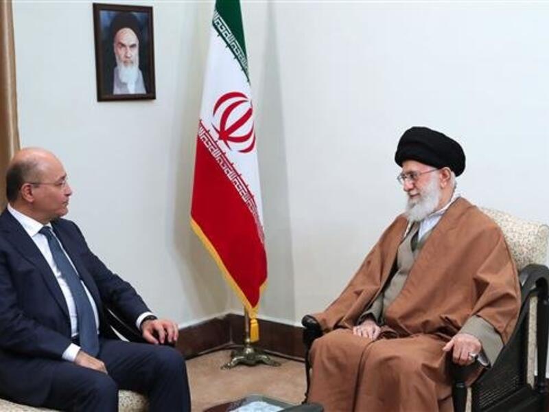 Leader of the Islamic Revolution Ayatollah Seyyed Ali Khamenei (R) and Iraqi President Barham Salih. (khamenei.ir)