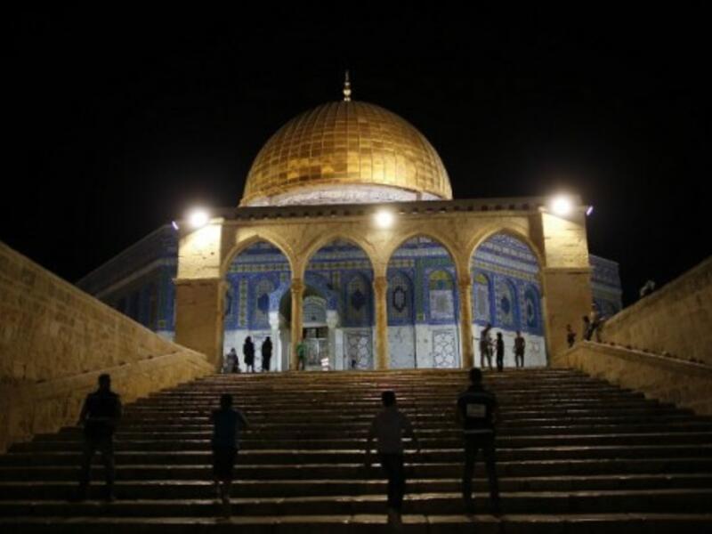 Palestinians walk up towards Al Aqsa mosque. (AFP/File)