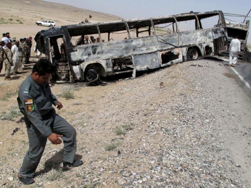 In April 2013 a bus hit a wrecked fuel tanker in the southern province of Kandahar. (AFP/File)