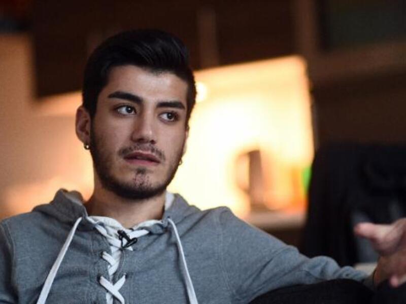 Omar, a 20-year-old Syrian gay refugee, speaks about his journey and about abuses against gay migrants by fellow travellers, during an interview with AFP in Aalsmeer, the Netherlands. (AFP/Emmanuel Dunand)