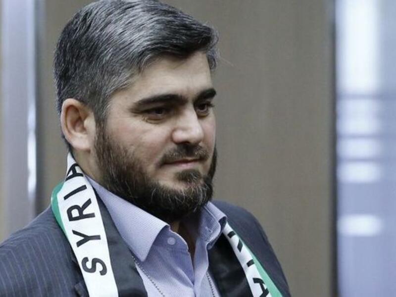 Mohammed Alloush has resigned over what he called the failure of peace talks. (AFP/File)