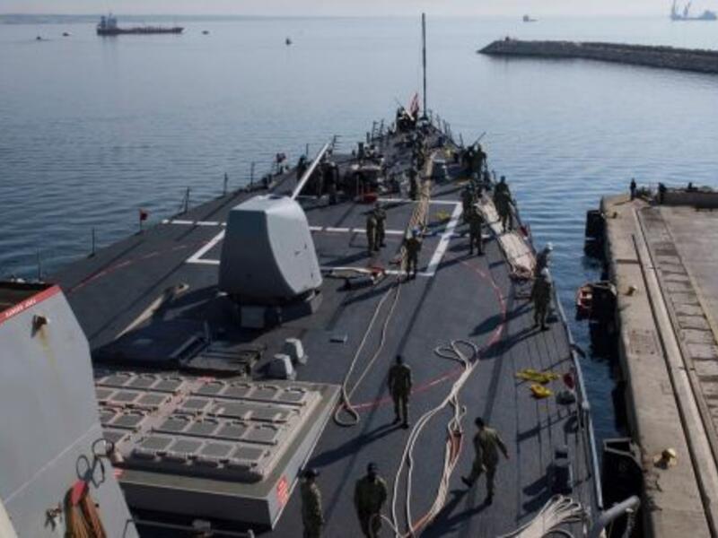 Guided-missile destroyer USS Donald Cook departing Larnaca, Cyprus on Monday (AFP)