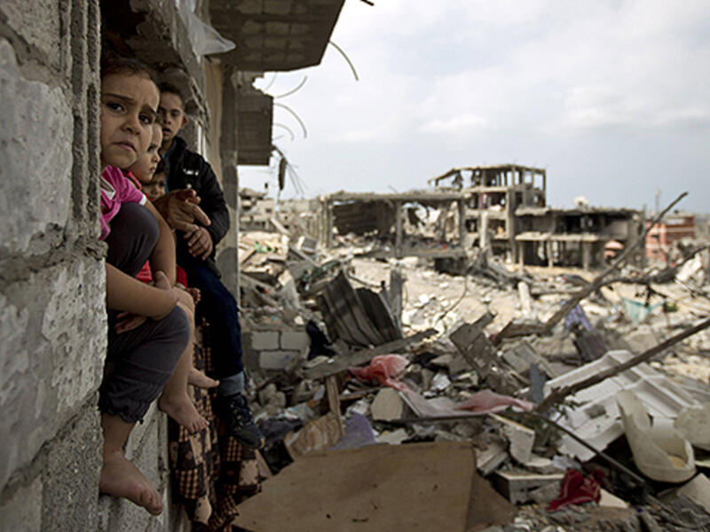 The last three Israeli operations – Operation Protective Edge, Operation Pillar of Defense and Operation Cast Lead – have led to the destruction of over 80,000 structures in Gaza. [AFP]