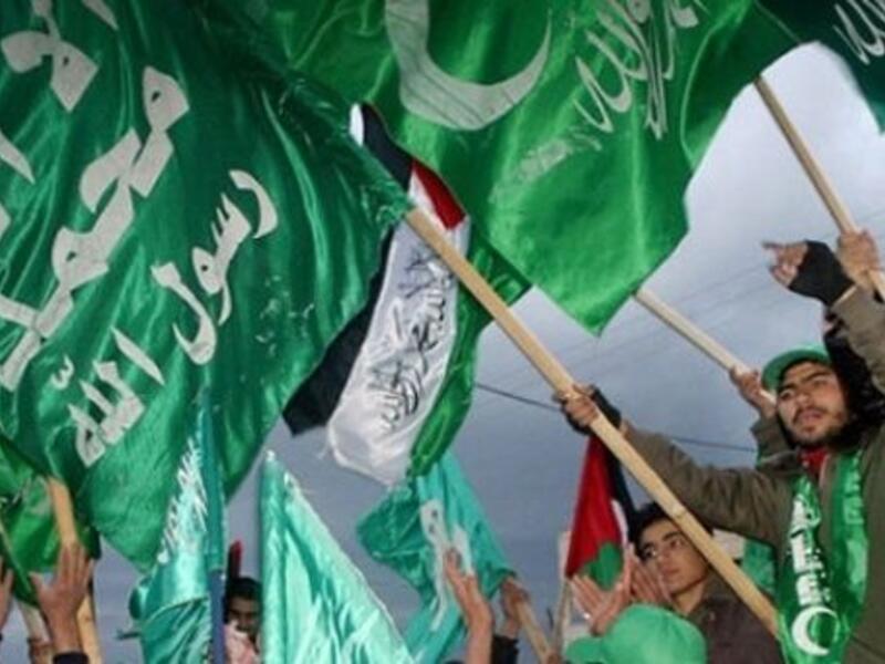Hamas supporters wave flags during a rally in Gaza. (AFP/ File Photo)