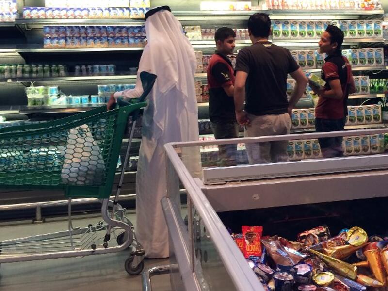 Customers are seen shopping at the al-Meera market in the Qatari capital Doha, on June 10, 2017.
 (Stringer/AFP)