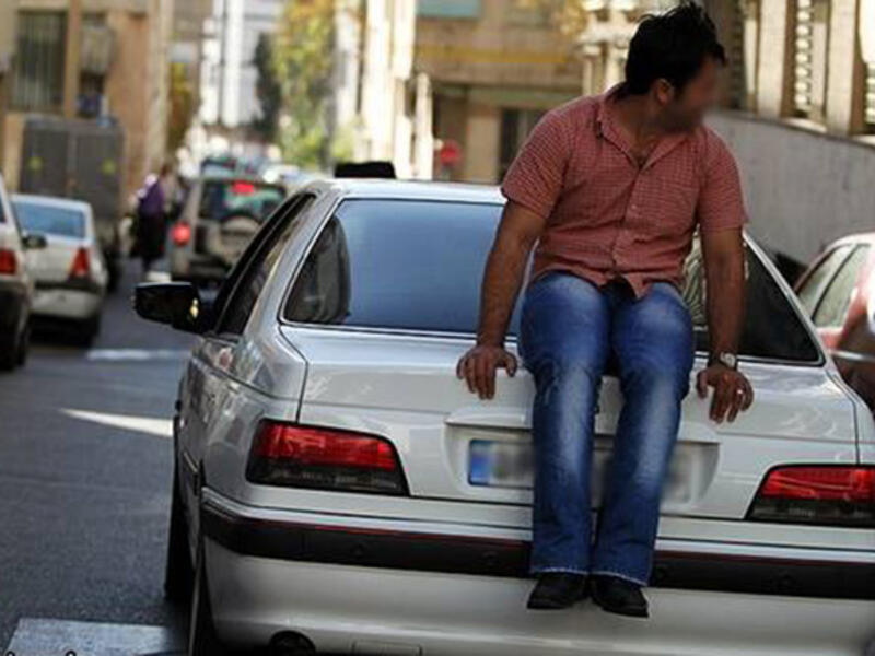 In Tehran, local authorities restrict the number of cars allowed on the road according to their license plates (even numbers are allowed one day, odd the next). Drivers have found a quirky solution: hire people to sit and walk behind their cars to cover the plate. Why not just tape over the numbers like they do in China?