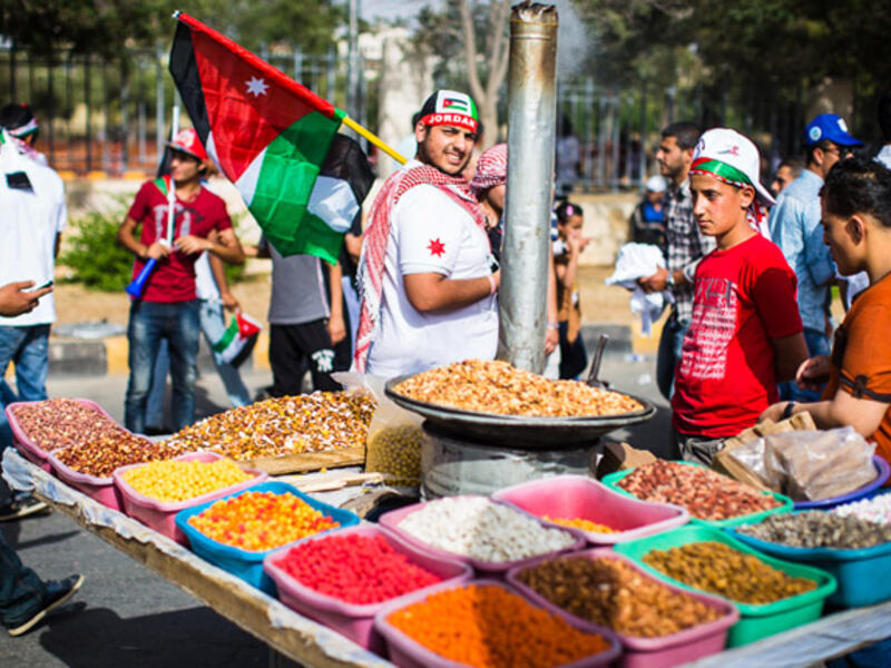 Just outside the gates to King Hussein Park, large crowds gathered in the afternoon to watch the Royal Jordanian Air Force fly overhead in an airshow, while the occasional parade marched by.