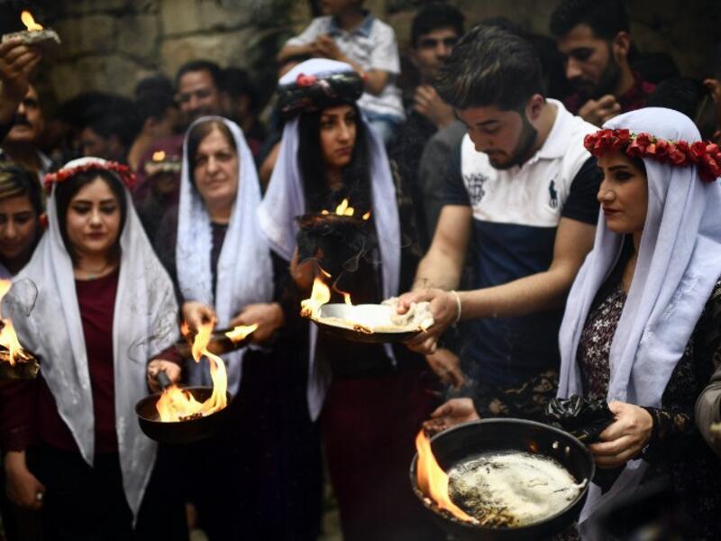 The Yazidi new year is welcomed with candles and lamps in the Lalish Vallley, Iraq. The celebrations announce the birth of spring and a new cycle of life, commemorating the creation of the universe and honoring nature. 