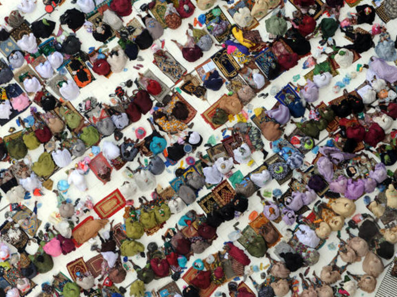Muslim pilgrims arrive to perform the afternoon prayer in Mecca's Grand Mosque. (Image credit: AFP)