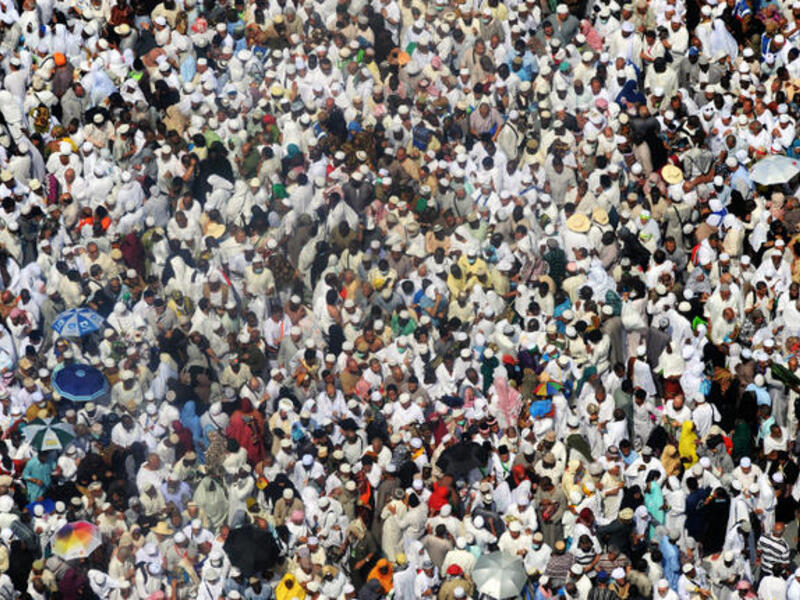 Muslim pilgrims leave after the afternoon prayer in Mecca's Grand Mosque. (Image credit: AFP)