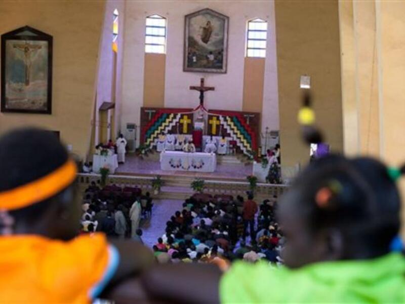 South Sudanese attend a Christmas service at the Juba Catholic cathedral, in the southern Sudan's capital city, in what may be their last Christmas in a unified Sudan. 
