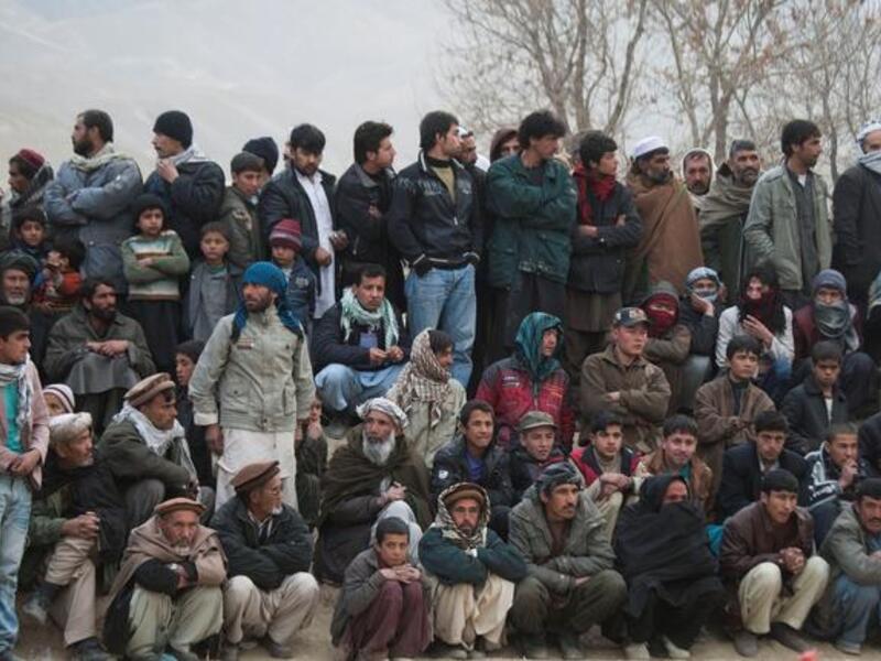 Afghans spectate during the weekly dog fights.