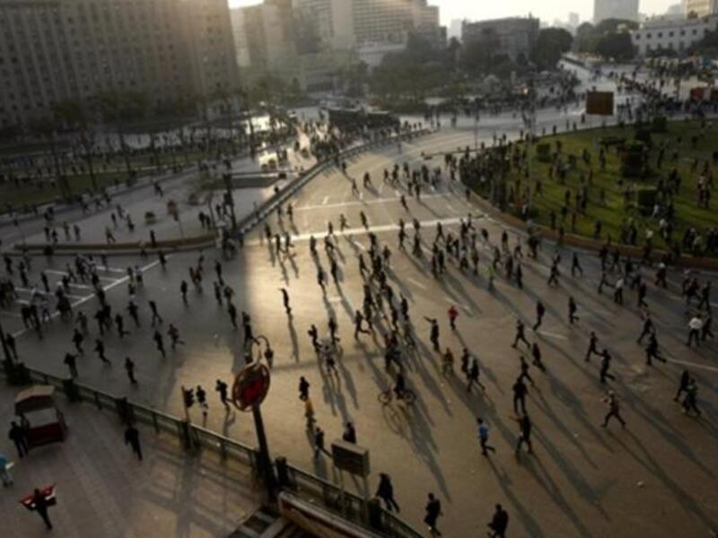 The protesters, carrying flags and chanting slogans against the government.
