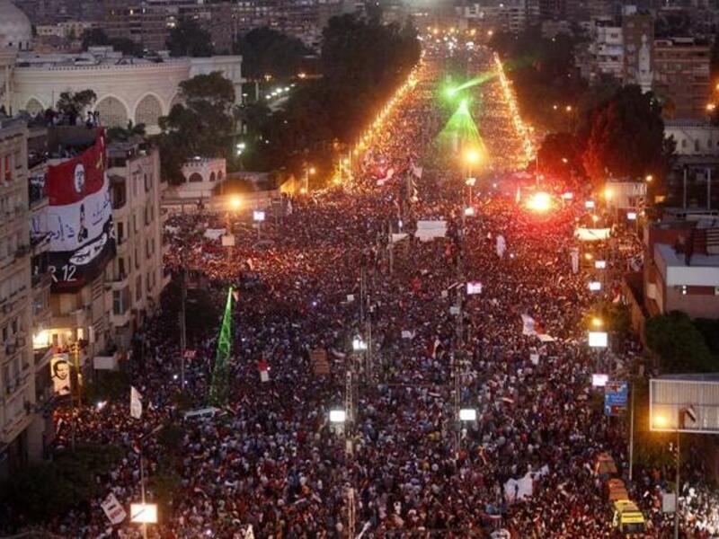 Hundreds of thousands of Egyptians flood the streets outside the presidential palace in Cairo (AFP)