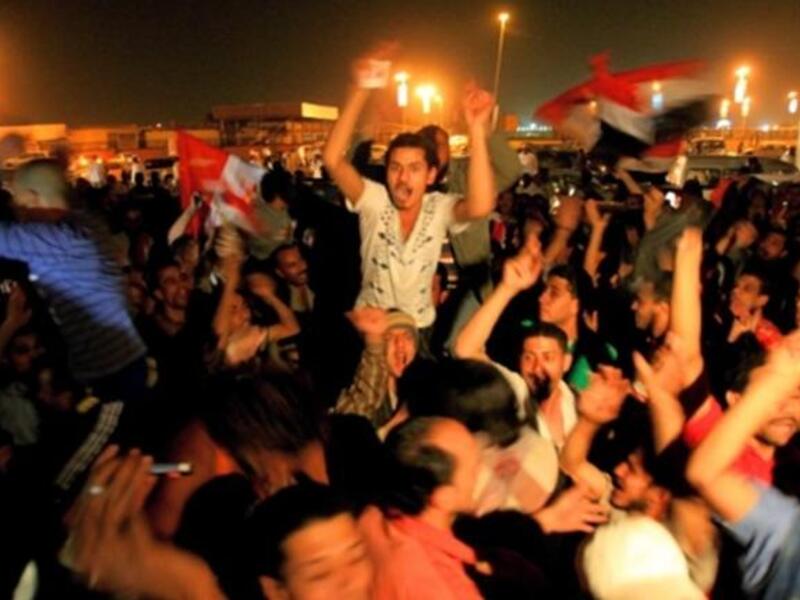 Egyptians in the Sudanni capital, Khartoum, hail the fall of Mubarak who succumbed to a series of popular protests that lasted for 18 days.