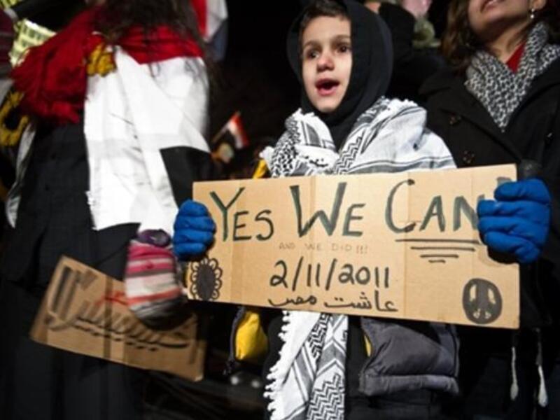 Egyptians in Washington DC, US, apply the once resonant "Can-do" campaign to celebrate people power outside the Egyptian embassy from their US seat of government vantage.