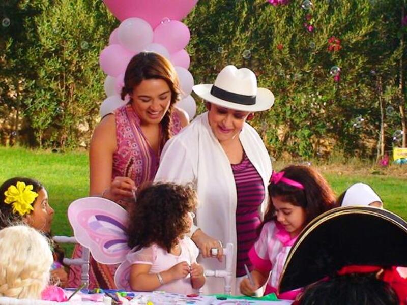 Star singer ‘Warda’ Al-Jaza'eriya (Known by her family name, translated, 'the Algerian'), aptly, Algerian origin, celebrates her birthday
with her new grandchild, and the release of a new video clip.