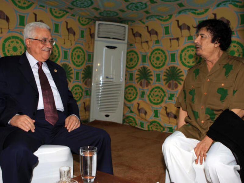 Mahmoud Abbas meets with Gaddafi (R) inside Gaddafi's personal tent in Sharm el-Sheikh, Egypt.  He has been associated with Pan Arabism, Pan Islamism and African Union.