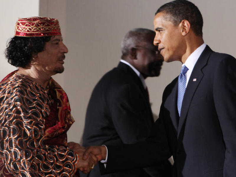 Other world leaders are not immune to the charms of this bizarre personality : Gaddafi shakes hands with U.S. President Barack Obama during the G8 summit on July 9, 2009 in L'Aquila, Italy.