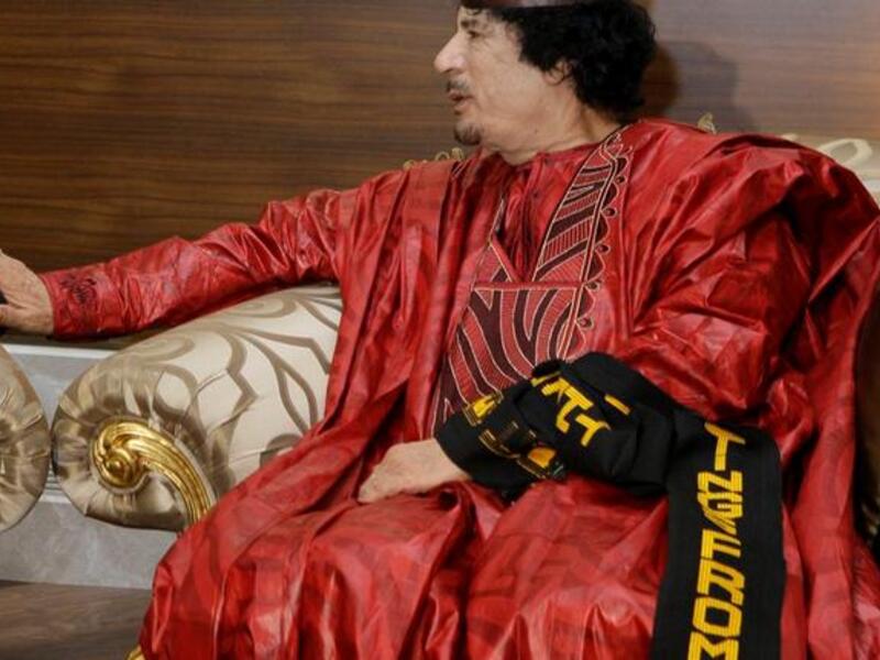 Bright colors and pomp: Gaddafi not one for making a quiet entrance: loves the spotlight, adopting an exaggerated almost pantomime dress style at times, confirming his reputation as eccentric and flamboyant.