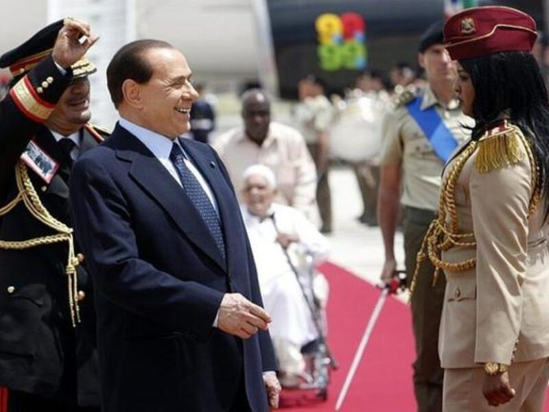يشترك القذافي ورئيس الوزراء الايطالي بيرلسكوني في الاهتمام بالعنصر النسائي ولكن بطرق مختلفة على ما يبدو.