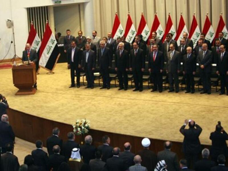 Iraqi Parliament Speaker Osama al-Nujaifi addresses the parliament as lawmakers gave Prime Minister Nuri al-Maliki's government a vote of confidence and adopted a 43-point program 