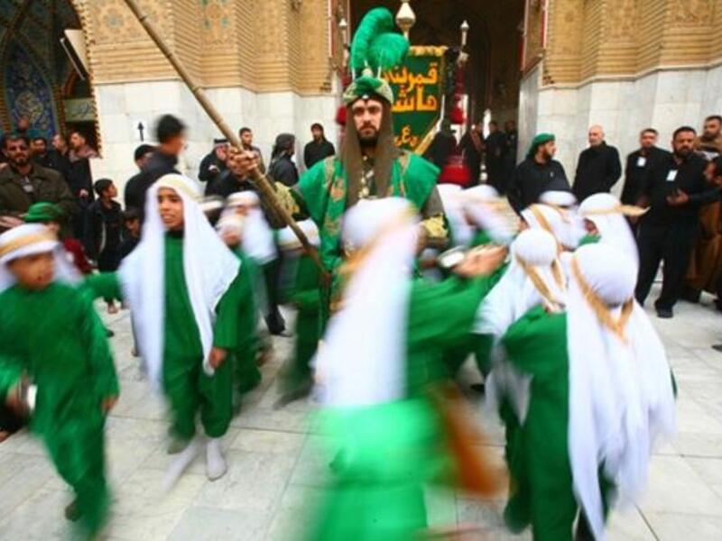 Shiite Muslims act the story of Imam Hussein in an Ashura ritual in the shrine city of Karbala as believers prepare to mark the religious event of Ashura in commemoration of ten days of mourning for Imam Hussein, the grandson of Prophet Mohammed who was killed in the Battle of Karbala.