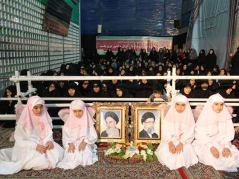 Iranian women gather during the ceremony.