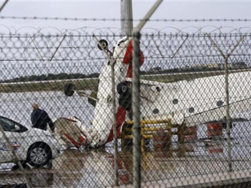 A damaged pilot training plane is pictured at the tarmac of Beirut international airport, as heavy winds topped 100 kilometres (60 miles) an hour.