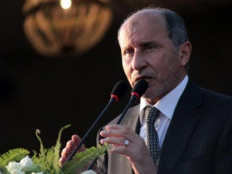 Libyan NTC leader Mustafa Abdul Jalil speaks during a ceremony announcing the liberation for the country. 
During a happy but somber speech in which he marked the heroic sacrifice of the dead fighters for Libya's freedom day, offering his sympathy for Turkey's earthquake victims, he hails the new age of peace, unity, and Islamic values.