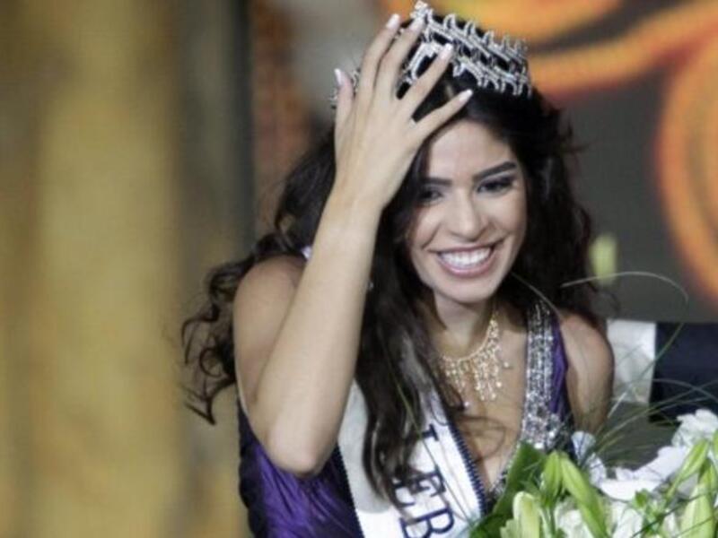  Yara Khoury Mikael is crowned after winning the Miss Lebanon 2011 beauty contest in the commercial center of downtown Beirut.