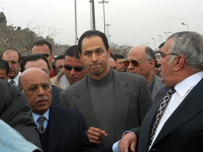 Gamal Mubarak- Arrested wearing white, while claiming innocence, and showing shock and disbelief. Probably disbelief cause they didn’t think it would come to this. Unshaven, Jamal was more disheveled than elder brother Alaa.