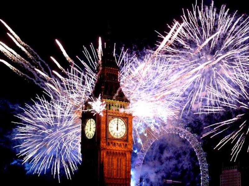 Fireworks light up the London skyline and Big Ben just after midnight in London, England. Thousands of people lined the banks of the River Thames in central London to see in the New Year with a spectacular fireworks display.