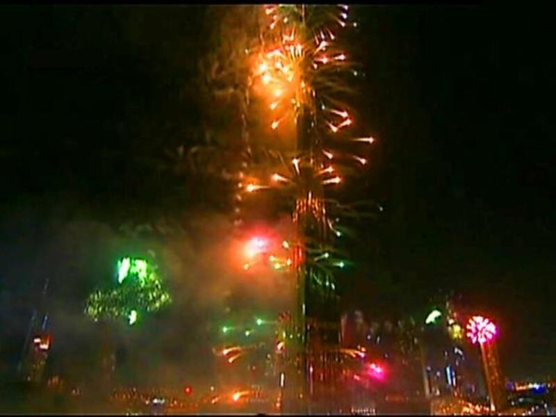 Burj Khalifa goes up in flames-- of the pyrotechnic variety-- in an impressive display of light to welcome in the New Year, 2012.