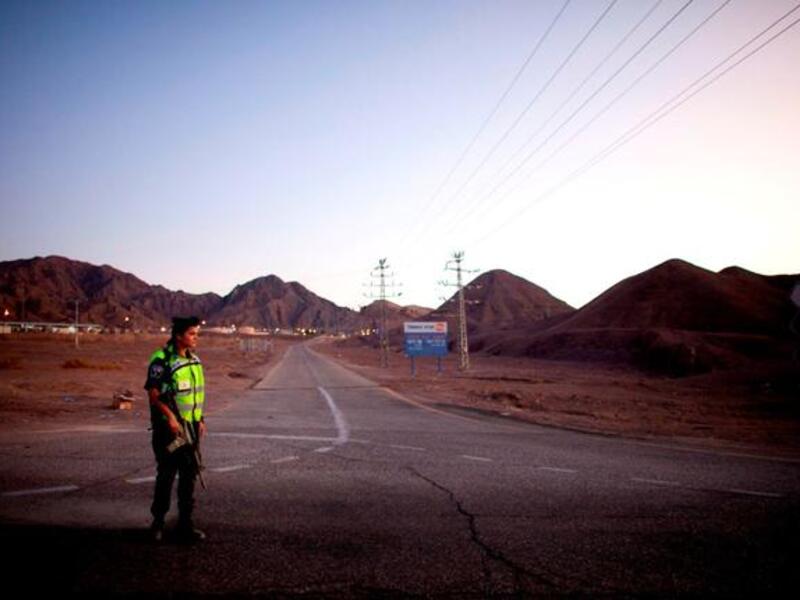 Enemy lines drawn in the Israeli-Egyptian detente: Spates of border clashes and a retaliatory attack on Israel since their killing 
of Egyptian border guards. These security personnel were pursuing militants who carried out earlier attacks on an Israeli bus. 
Protests demand a departure from the peace treaty 'friendship' betwixt Egypt & Israel.