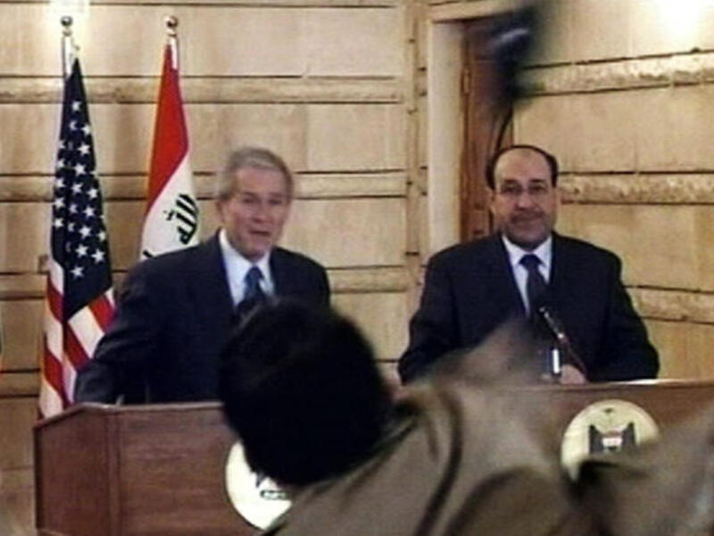 george bush shoe throw