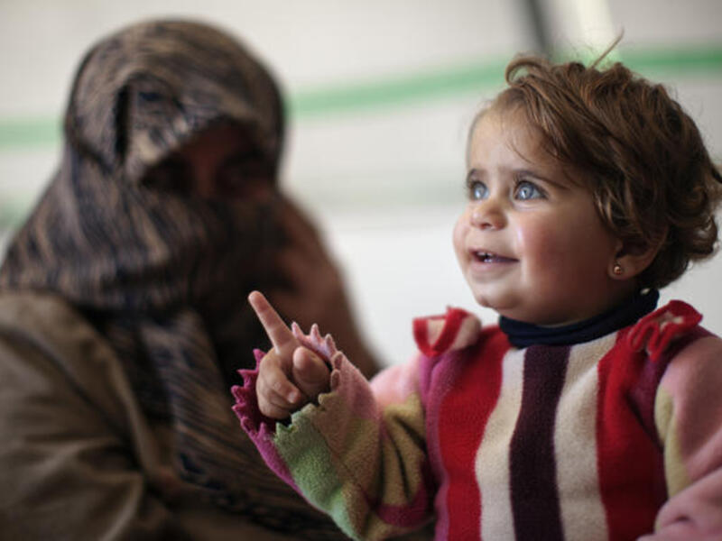 baby refugee camp (UNHCR/ B. Sokol)