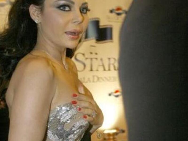 Aware of the attention as she crops up on website celebrity bra-size-finder (as 34C before you check), she places her arms across her burning bosom. Burning cause people are talking about it. Word on the web suggests a size-shift from 36A to 36D.