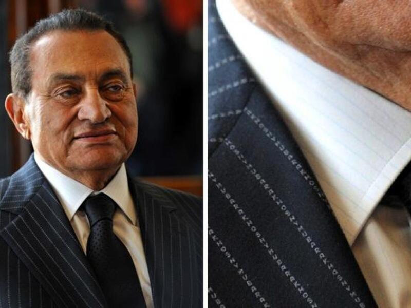 From Savile Row to (desired verdict by some) Death Row?? Once, not so long ago, Mubarak mindful of his
sartorial image to the 'fine-print', ordered his name stitched into the pinstripes of his suits. Signature bespoke suits, betray a dash of meglomania,
given the cost in time and money for the intricate weaving required by the tailor. 