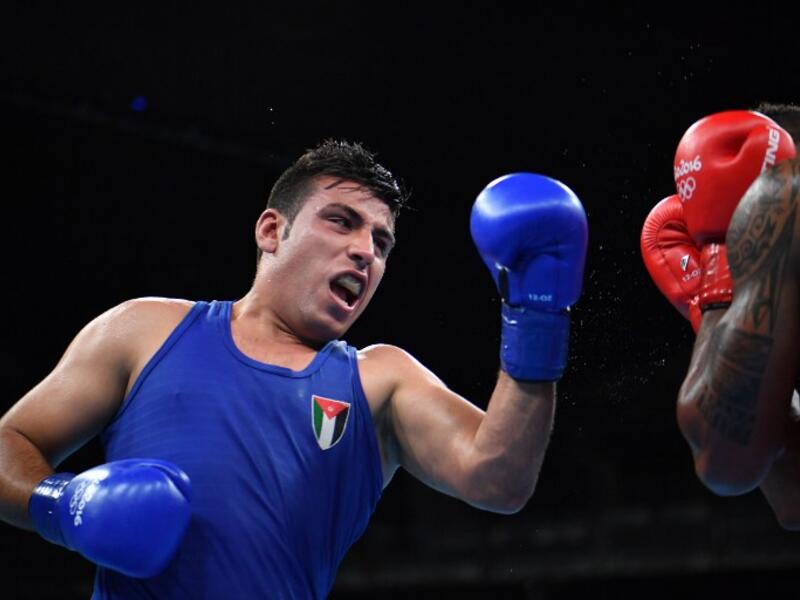 Jordan's Hussein Iashaish fights France's Tony Victor James Yoka during the Men's Super Heavy (+91kg) Quarterfinal 1 match at the Rio 2016 Olympic Games at the Riocentro - Pavilion 6 in Rio de Janeiro on August 16, 2016.
Yuri CORTEZ / AFP