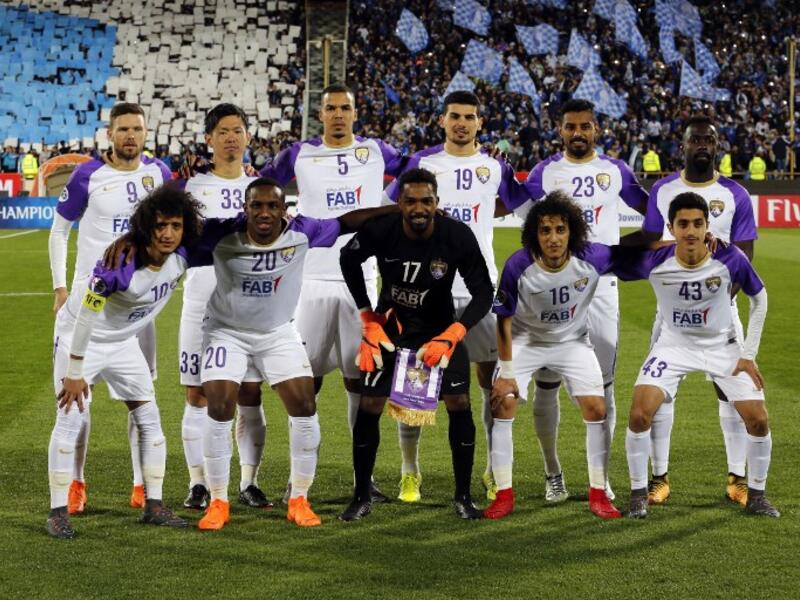Al-Ain's starting eleven pose for a group picture ahead of the AFC Asian Champions League group D football match on March 12, 2018, at the Azadi Stadium in Tehran.
ATTA KENARE / AFP