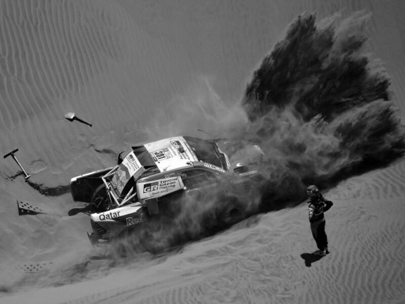 Toyota's driver Nasser Al-Attiyah of Qatar and his co-driver Matthieu Baumel of France get stuck in the sand dunes during Stage 4 of the Dakar 2018, in and around San Juan De Marcona, Peru, on January 9, 2018.
FRANCK FIFE / AFP
