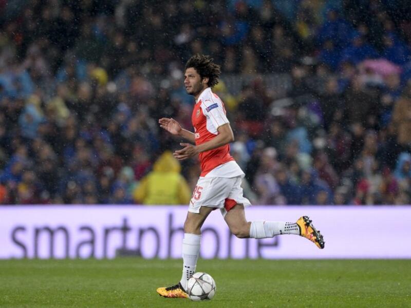 Arsenal's Egyptian midfielder Mohamed Elneny celebrates his goal during the UEFA Champions League Round of 16 second leg football match FC Barcelona vs Arsenal FC at the Camp Nou stadium in Barcelona on March 16, 2016.
JOSEP LAGO / AFP