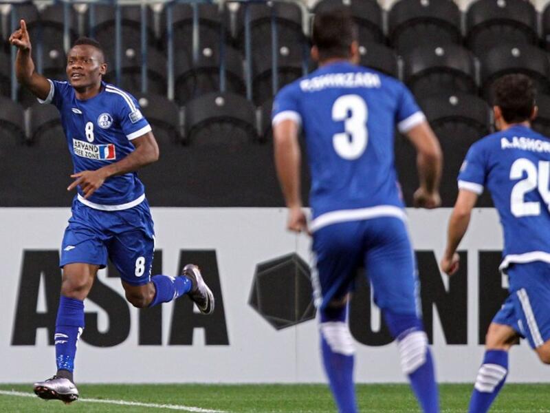 Esteghlal Khuzestan's Aloys Nong celebrates his goal against UAE's al-Jazira during an Asian Champions League Group B football match at Mohammed Bin Zayed Stadium on February 27, 2017.
NEZAR BALOUT / AFP