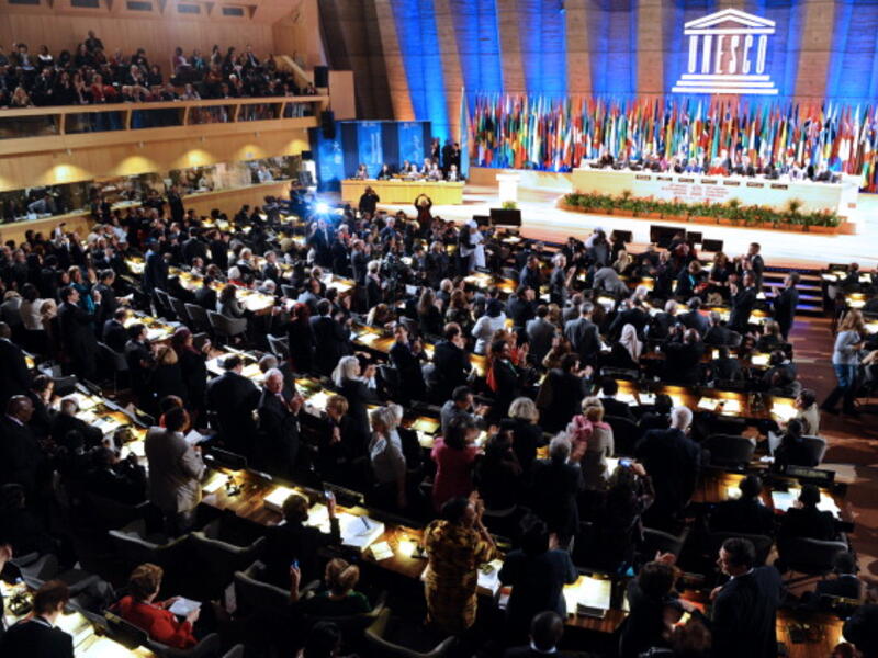 Delegates applaud following the vote which admitted Palestinians to enter UNESCO as a full member on October 31, 2011 at the headquarters of the organization in Paris. [Getty Images]