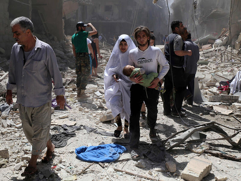 A bombed out neighborhood in east Aleppo (AFP/File)